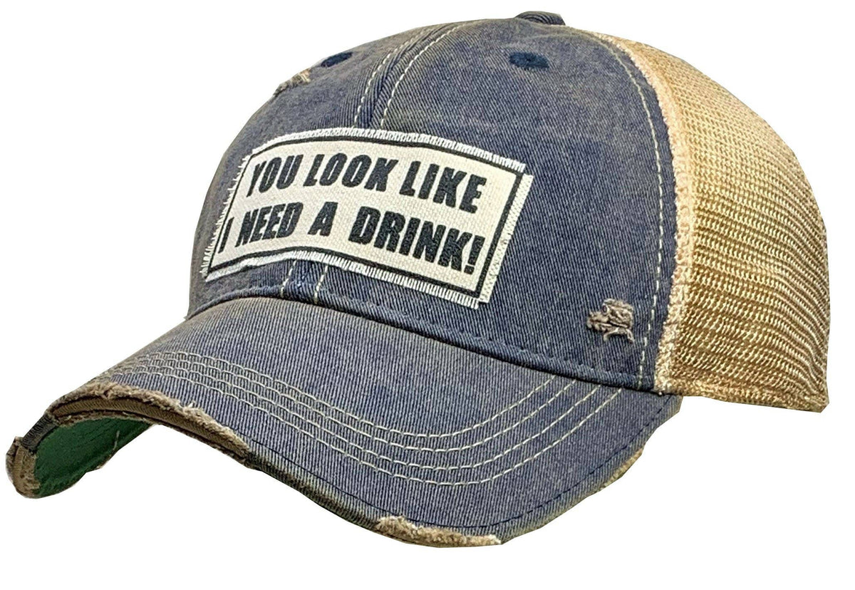 YOU LOOK LIKE I NEED A DRINK Trucker Hat