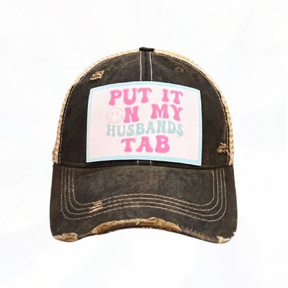 Put It On My Husband's Tab Trucker HAT