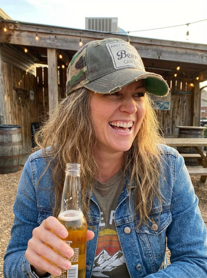 AIN'T NOTHING THAT A BEER CAN'T FIX Trucker Hat