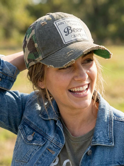 AIN'T NOTHING THAT A BEER CAN'T FIX Trucker Hat