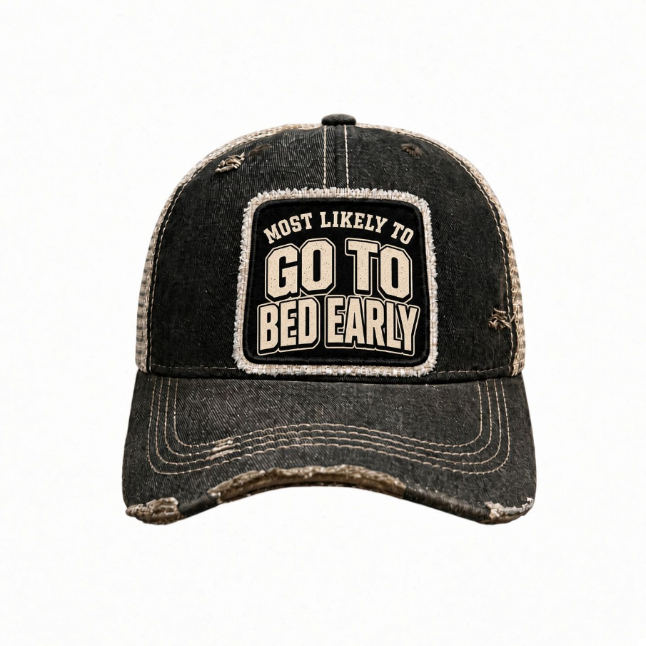 MOST LIKELY TO GO TO BED EARLY distressed trucker hat - Black